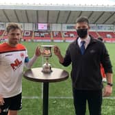 Clyde skipper David Goodwillie receives the Broadwood Cup from Matt Mitchell, Culture & Leisure North Lanarkshire team leader at Broadwood LC (pic: Craig Black Photography)