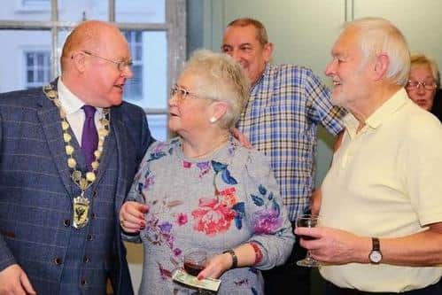 Crisp £1 notes were presented to pensioners by chairman Andy Morrison.
