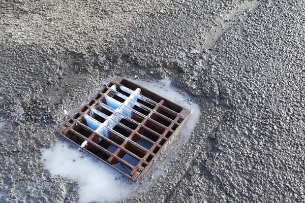 The paint that was emptied down a drain