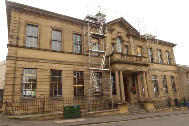 The scaffolding was erected at the library last week to allow workers access to the roof; work was expected to be completed yesterday (Tuesday).