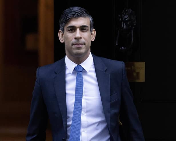 LONDON, ENGLAND - JANUARY 18: Britain's Prime Minister, Rishi Sunak, leaves 10 Downing Street to attend Prime Minister's Questions in the House of Commons on January 18, 2023 in London, England. (Photo by Dan Kitwood/Getty Images)