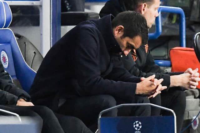 Rangers manager Giovanni van Bronckhorst looks dejected during the 7-1 defeat by Liverpool at Ibrox.