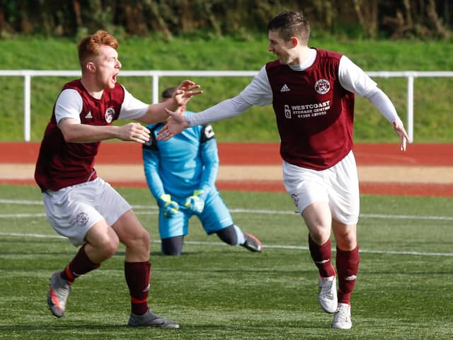 Carluke's Mark O'Reilly (left) celebrates with scorer James Frame after Frame's late goal against Port Glasgow Juniors made it 2-2 (Pic by Kevin Ramage)