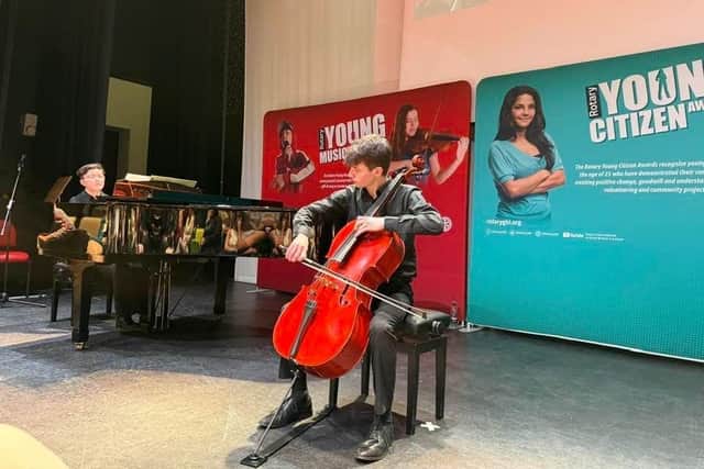 Cellist Johnny Gray performing in the final
