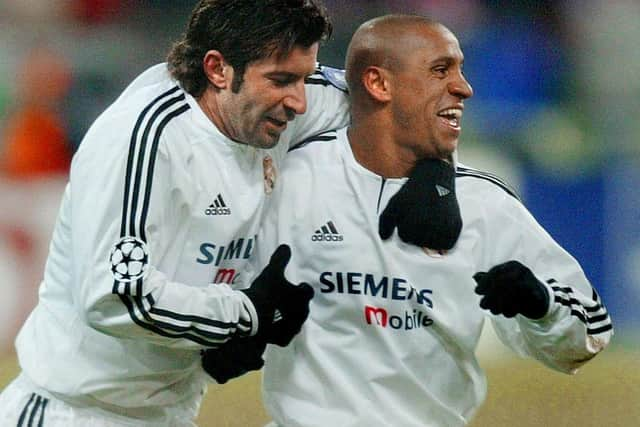 Lui Figo and Roberto Carlos will be team-mates again at Ibrox next year (Photo by PIERRE-PHILIPPE MARCOU/AFP via Getty Images)