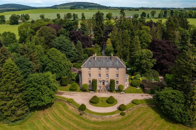 The house also comes with a tennis court.