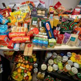 A month-long campaign is urging Portsmouth residents to donate food items to food banks, pantries and suppliers as the cost of living continues to soar. (Photo by TOLGA AKMEN/AFP via Getty Images)