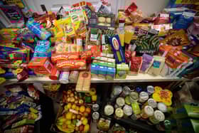 A month-long campaign is urging Portsmouth residents to donate food items to food banks, pantries and suppliers as the cost of living continues to soar. (Photo by TOLGA AKMEN/AFP via Getty Images)
