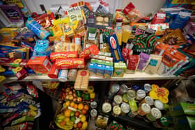 A month-long campaign is urging Portsmouth residents to donate food items to food banks, pantries and suppliers as the cost of living continues to soar. (Photo by TOLGA AKMEN/AFP via Getty Images)