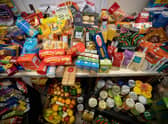 A month-long campaign is urging Portsmouth residents to donate food items to food banks, pantries and suppliers as the cost of living continues to soar. (Photo by TOLGA AKMEN/AFP via Getty Images)