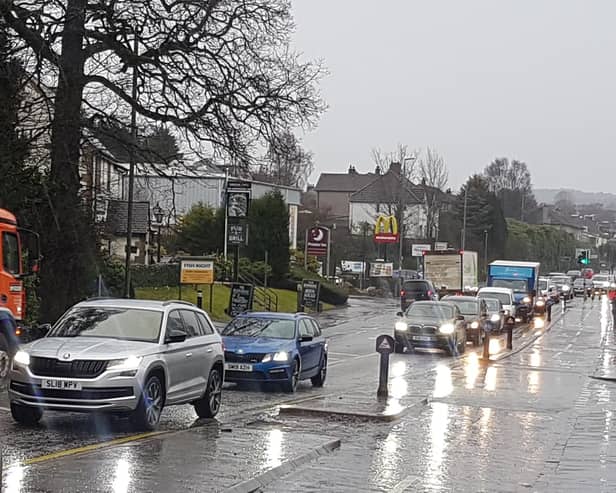 Temporary traffic lights put up for the start of the work on the A81 demonstrate the extent of the problem as cars back all the way towards Milngavie police station