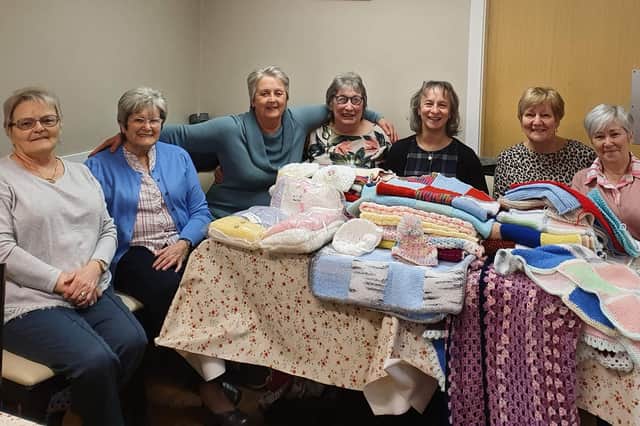 The knit and natter group decided to donate some of their work to help families in Ukraine.