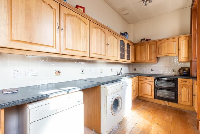 Both kitchens look out over the rear of the house.