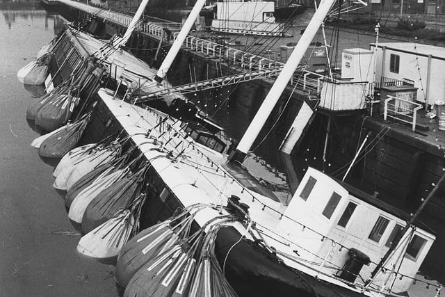 Plastic Bags filled with water help to lever the Carrick upright ready for refloating after it sunk into the Clyde in central Glasgow