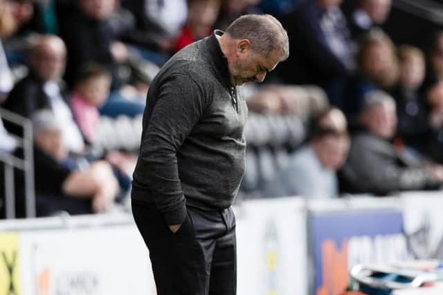 Celtic manager Ange Postecoglou cuts a miserable figure during the 2-0 defeat by St Mirren in Paisley in which he said a first league loss in 364 days was down to being devoid of the level of work ethic, performance and belief that are required. (Photo by Craig Williamson / SNS Group)