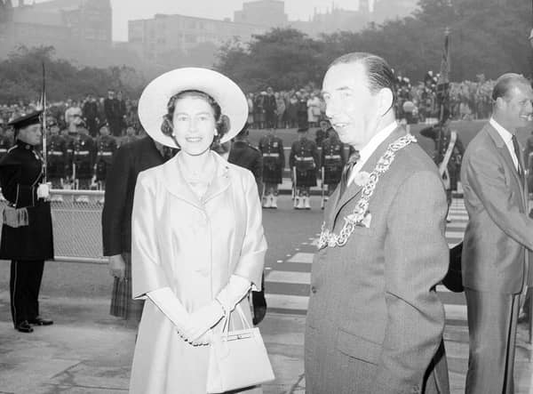 The Queen arrives in Glasgow for a visit in September 1964.