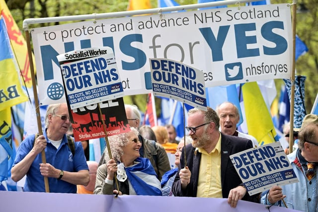 Many held 'defend our NHS' banners.