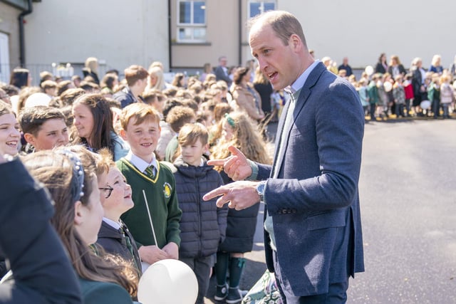 Prince William meets pupils at the school.