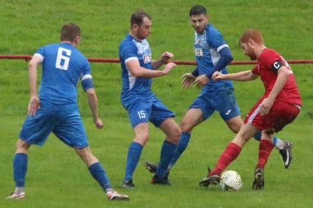 Declan Brown (1st right) in action for Thorniewood United (Submitted pic)
