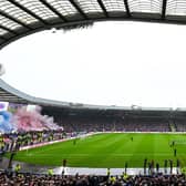 The start of the Scottish Cup semi-final between Celtic and Rangers was engulfed in smoke from pyro. (Photo by Paul Devlin / SNS Group)