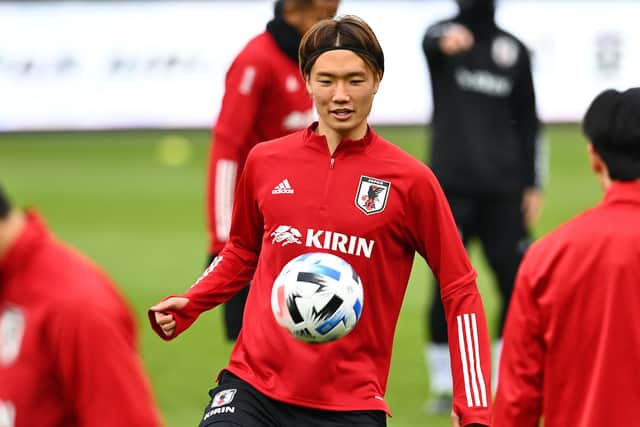 Ko Itakura takes part in a training session ahead of a friendly match between Japan and Panama in Austria
