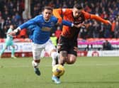 Dundee United's Tony Watt and Rangers' James Tavernier during a Cinch Premiership match in February.  (Photo by Alan Harvey / SNS Group)