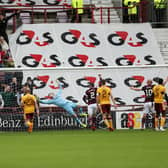 Despair for 'Well as Kingsley's free-kick makes it 2-0 Hearts