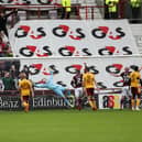 Despair for 'Well as Kingsley's free-kick makes it 2-0 Hearts