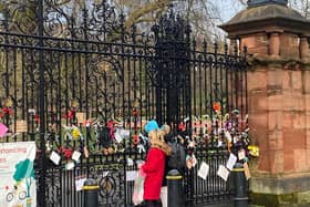 Tributes at the entrance to Kelvingrove Park in Glasgow