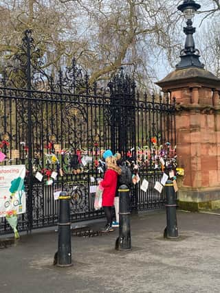 Tributes at the entrance to Kelvingrove Park in Glasgow