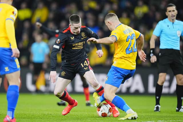Rangers winger Ryan Kent takes on Brondby's Josip Radosevic during the Europa League match in Denmark. (Photo by MARTIN SYLVEST/Ritzau Scanpix/AFP via Getty Images)