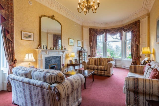 The house has a large drawing room as well as this smaller sitting room.