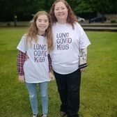 Tracy McMullen and daughter Eva, whose brother Jonathan is bedbound with long covid