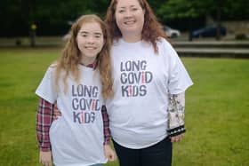 Tracy McMullen and daughter Eva, whose brother Jonathan is bedbound with long covid