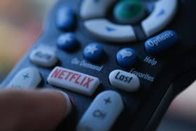 Netflix is launching the sub-account model soon, and a cheaper subscription package next month. Picture: Chris DELMAS/AFP via Getty Images.