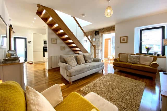 A clever use of space makes for an enviably roomy lounge.