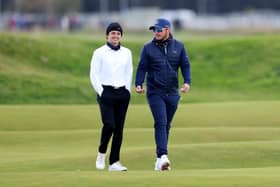 Ewen Ferguson shares a joke with pro-am partner Brad Simpson, lead singer of The Vamps, at The Alfred Dunhill Links Championship. (Photo by Richard Heathcote/Getty Images)