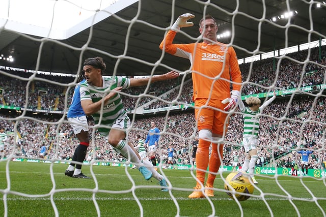 Jota runs off to celebrate after opening the scoring.