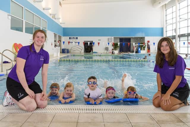 Swimming teachers Keira Higgins and Cara Murray with some of their pupils.
‘