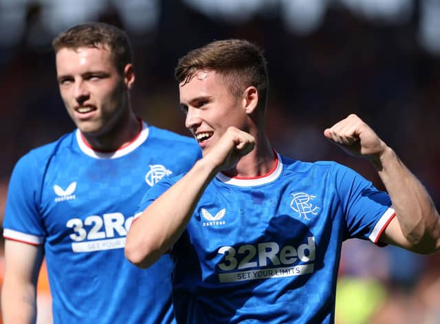 Rangers' Charlie McCann celebrates scoring their side's second goal of the game during a pre-season friendly match at Bloomfield Road, Blackpool.