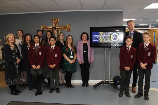 Staff and pupils at St Ninian's High celebrate the GTC award