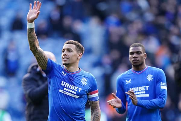 Rangers' James Tavernier (left) gestures towards the fans following during the cinch Premiership match at Ibrox.