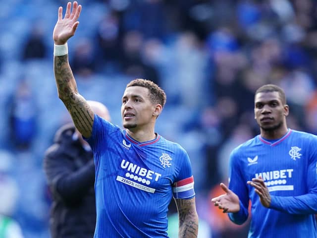 Rangers' James Tavernier (left) gestures towards the fans following during the cinch Premiership match at Ibrox.
