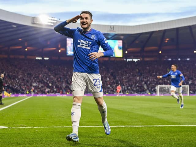 Rangers' Scott Wright salutes the crowd after scoring his team's second goal at Hampden against Hearts.