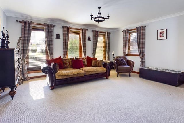 This living space offers a fantastic social area with dual aspect views - flooding the room with natural light.