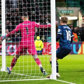 Celtic’s Gustaf Lagerbielke heads home the late winner against Feyenoord.