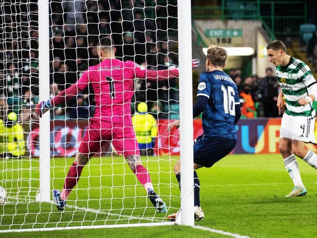 Celtic’s Gustaf Lagerbielke heads home the late winner against Feyenoord.