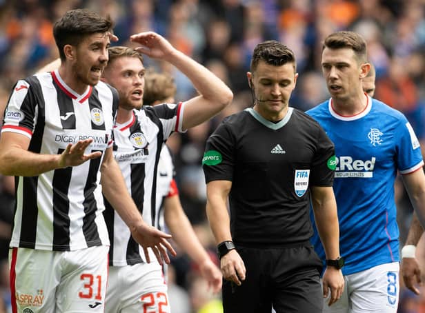 <p>St. Mirren's Declan Gallagher complains to the referee Nick Walsh after his foul on Antonio Colak resulted in a penalty to Rangers. (Photo by Alan Harvey / SNS Group)</p>