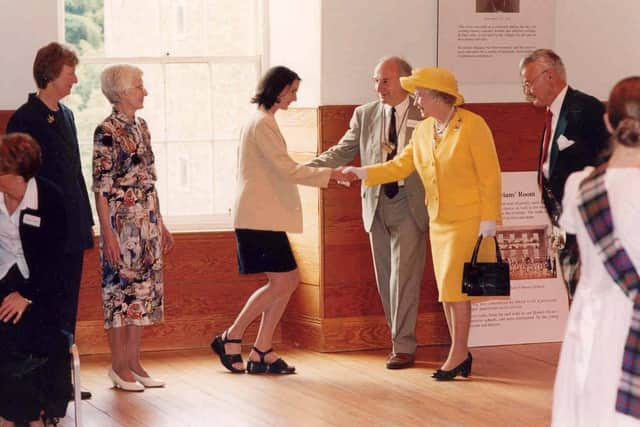 Staff and New Lanark Trustees were delighted to have an audience with Her Majesty in 2000.