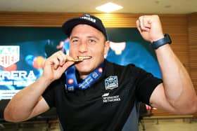 A jubilant Duncan Weir lands back at Glasgow Airport with his United Rugby Championship winners' medal after Glasgow Warriors' victory over the Vodacom Bulls in the final in South Africa. (Photo by Ewan Bootman / SNS Group)